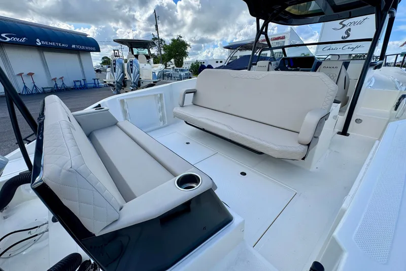 Slide: The Image of 2026 Navan S30 boat interior with luxurious seating and modern design at a marina. - 27