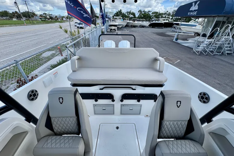 Slide: The Image of 2026 Navan S30 boat interior with luxurious seating and modern design at a marina. - 32