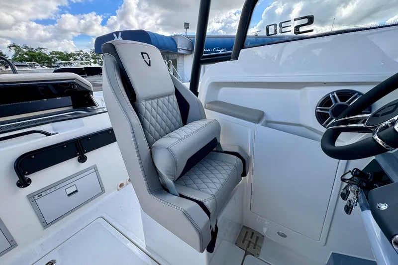 Slide: The Image of Luxurious interior of 2026 Navan S30 boat with quilted seating and modern controls. - 40