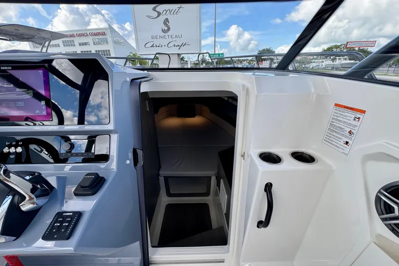 Slide: The Image of Interior view of 2026 Navan S30 boat cockpit with modern controls and cabin entrance. - 47