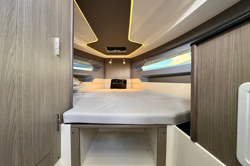 Slide: The Image of 2026 Navan S30 interior cabin with modern design, wood accents, and ambient lighting. - 52