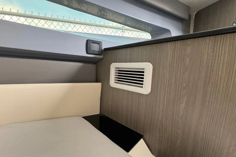 Slide: The Image of Interior of 2026 Navan S30 with wood paneling and air vent. - 62