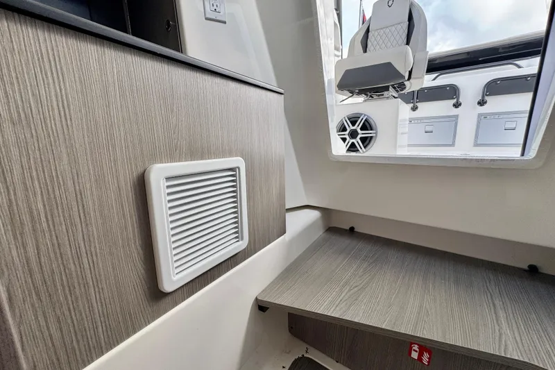 Slide: The Image of Interior of 2026 Navan S30 boat, featuring modern design and seating. - 63