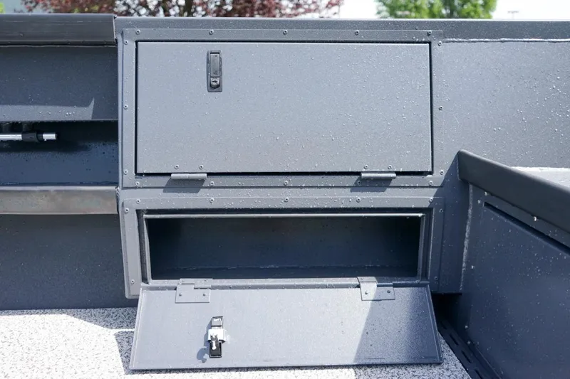 Slide: The Image of Storage compartments on 2026 Alumaweld 23' Columbia boat interior. - 10