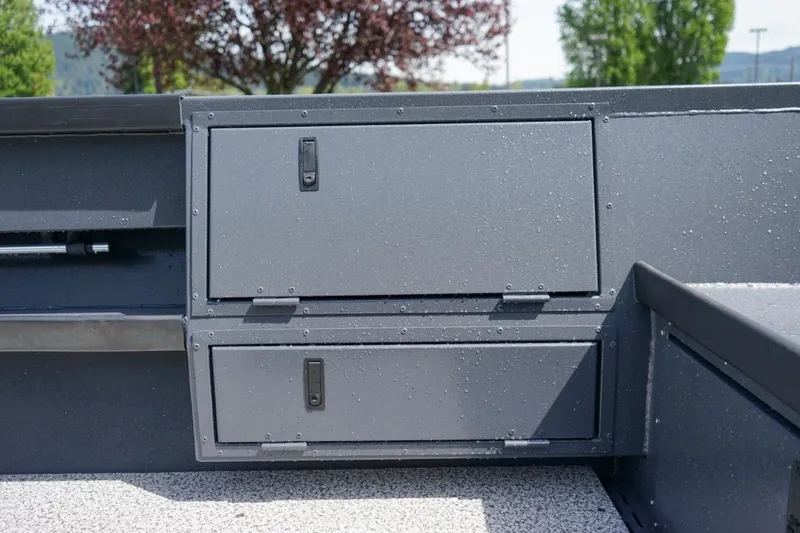 Slide: The Image of Storage compartments on a 2026 Alumaweld 23' Columbia boat, featuring sleek design and functionality. - 8