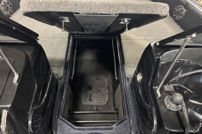 Slide: The Image of Open storage compartment in 2021 Nitro ZV19 Sport boat interior. - 14