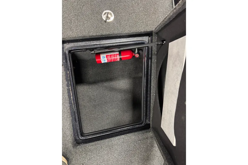 Slide: The Image of Storage compartment with fire extinguisher in 2021 Nitro ZV19 Sport boat. - 17