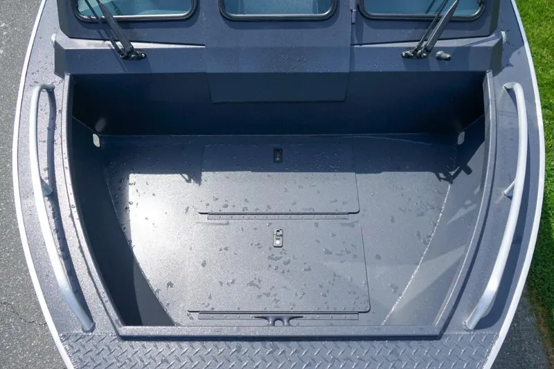 Slide: The Image of 2026 Alumaweld X202 Stryker boat interior, featuring spacious deck and storage compartments. - 19
