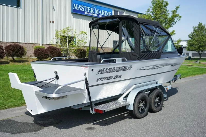 Slide: The Image of 2026 Alumaweld X202 Stryker boat on trailer at Master Marine Boat Center. - 3