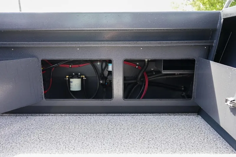 Slide: The Image of 2026 Alumaweld X202 Stryker boat interior wiring and storage compartments. - 7