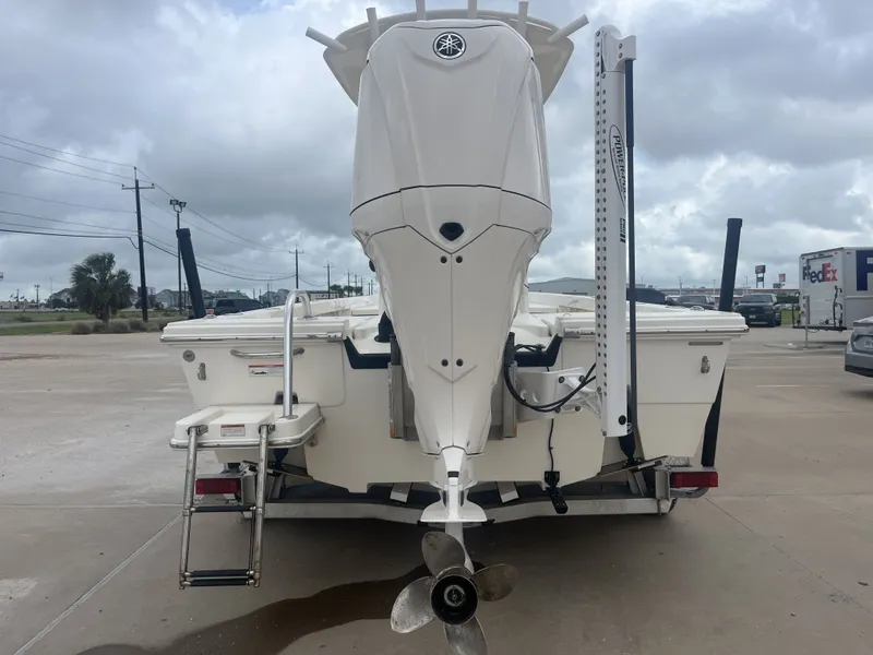 Slide: The Image of Rear view of a 2022 Pathfinder 2400 boat with outboard motor. - 9