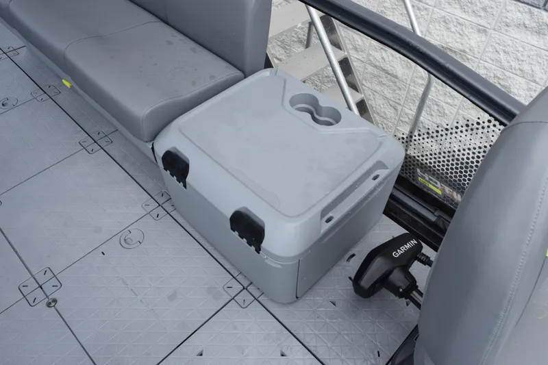 Slide: The Image of 2025 Sea-Doo Switch Fish 18 interior with seating and storage compartment. - 13