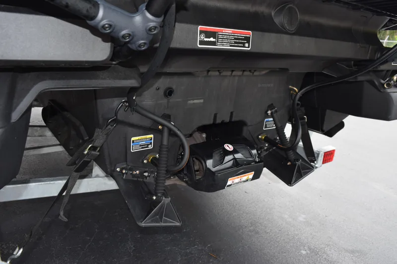 Slide: The Image of Rear view of 2025 Sea-Doo Switch Fish 18, showcasing engine and components. - 8