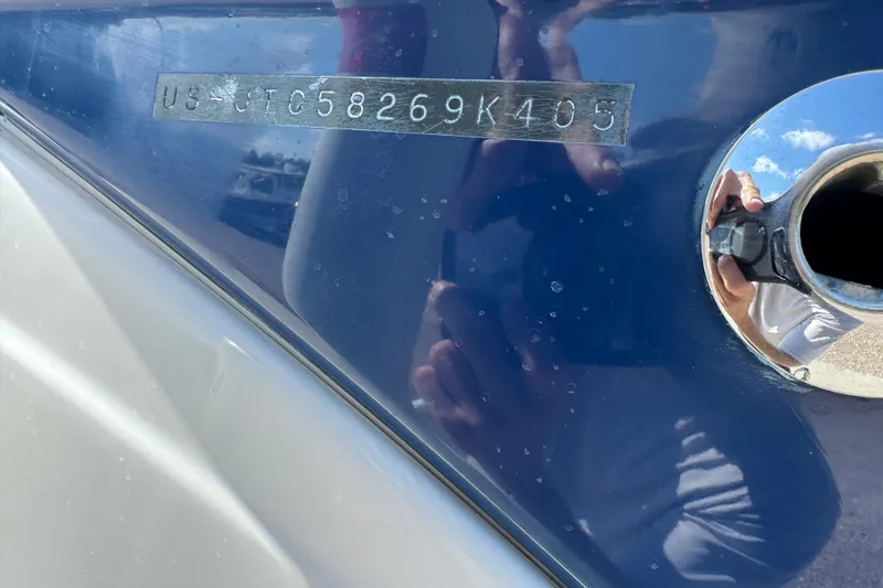 Slide: The Image of Close-up of a 2005 Crownline 240 EX boat hull identification number. - 27