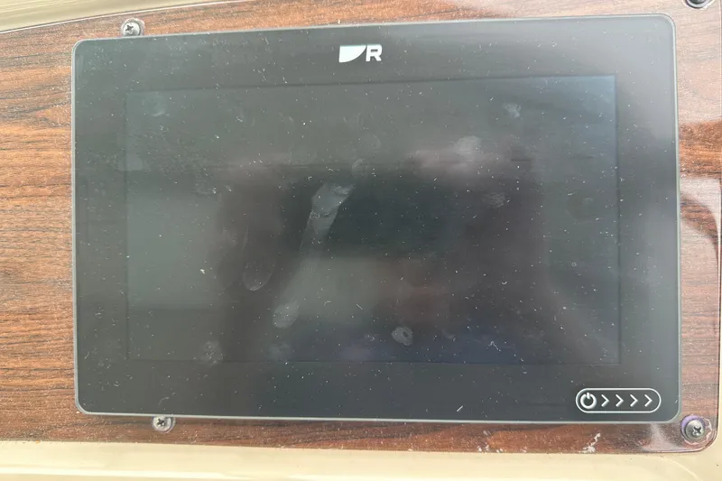 Slide: The Image of Touchscreen display on a 2005 Chaparral Signature 350 boat dashboard. - 18