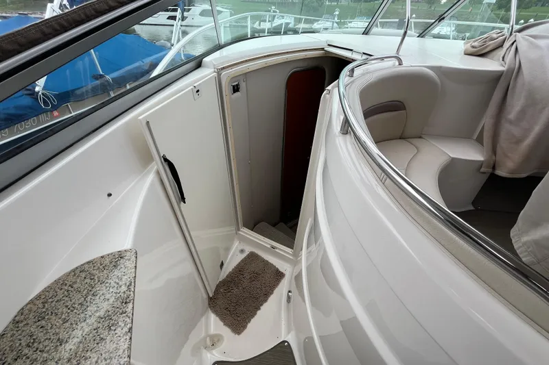 Slide: The Image of 2005 Chaparral Signature 350 boat interior with stairs and seating area. - 29