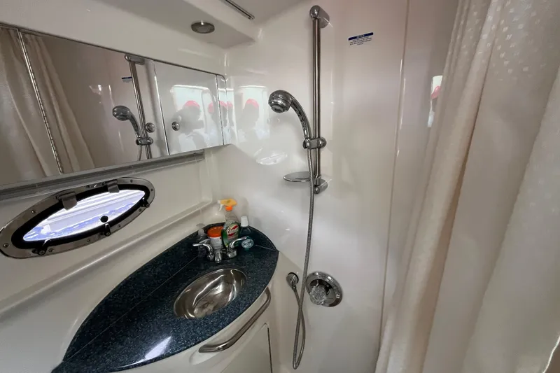 Slide: The Image of Bathroom interior of 2005 Chaparral Signature 350 yacht with shower and sink. - 33