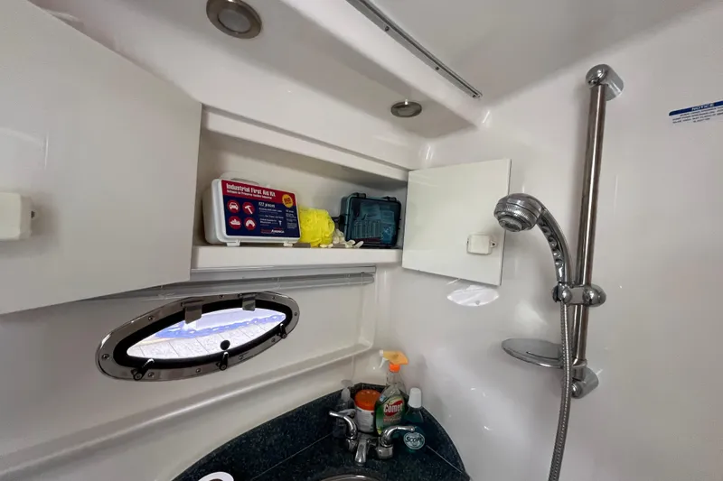 Slide: The Image of Bathroom interior of 2005 Chaparral Signature 350 yacht with shower and storage. - 35