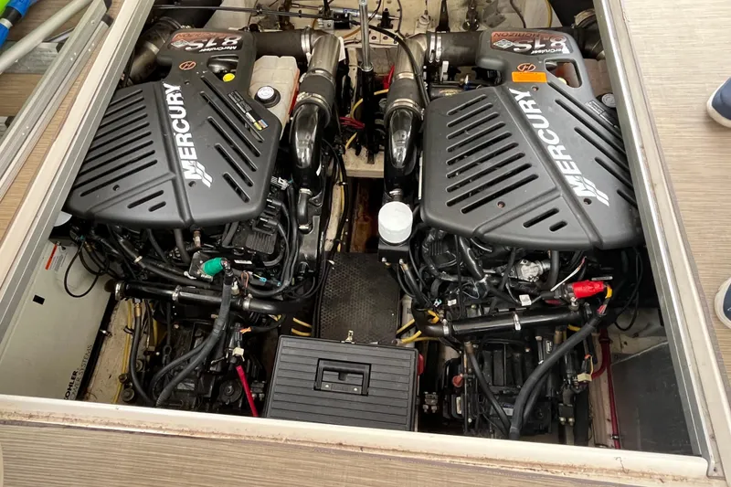 Slide: The Image of Engine compartment of a 2005 Chaparral Signature 350 with dual Mercury engines. - 50
