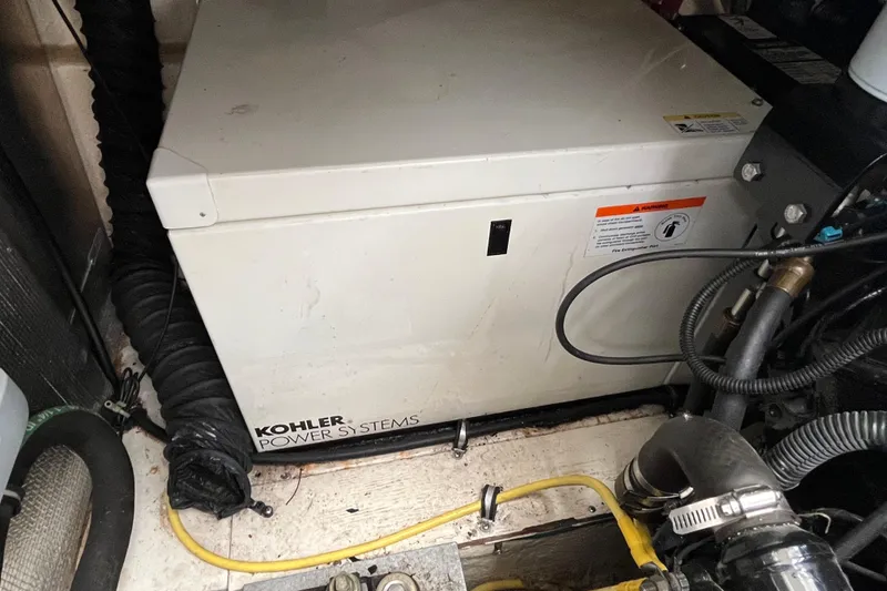 Slide: The Image of Kohler power system in 2005 Chaparral Signature 350 boat engine compartment. - 56