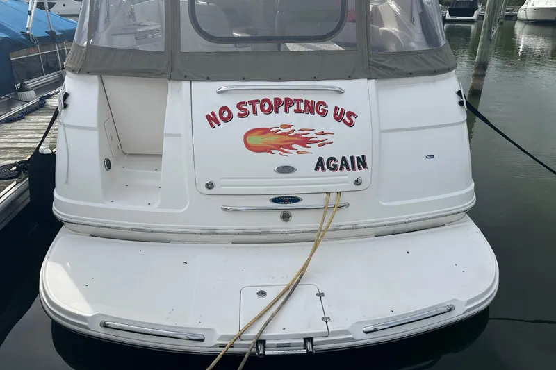 Slide: The Image of 2005 Chaparral Signature 350 boat with "No Stopping Us Again" text on the stern. - 57