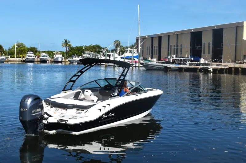 Slide: The Image of Chaparral 21 SSi 2021 boat in harbor with Yamaha outboard motor. - 1