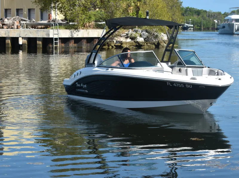 Slide: The Image of 2021 Chaparral 21 SSi boat on calm water. - 5