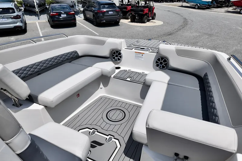 Slide: The Image of Interior of 2026 Starcraft SVX 211 OB CC boat with spacious seating and modern design. - 8