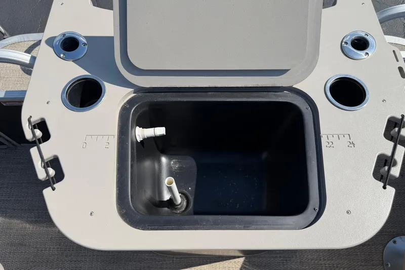 Slide: The Image of 2018 Bennington 21 SF boat livewell with cup holders and measuring scale. - 15