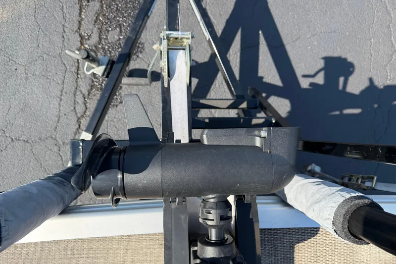 Slide: The Image of Overhead view of 2018 Bennington 21 SF boat trailer hitch on asphalt. - 21