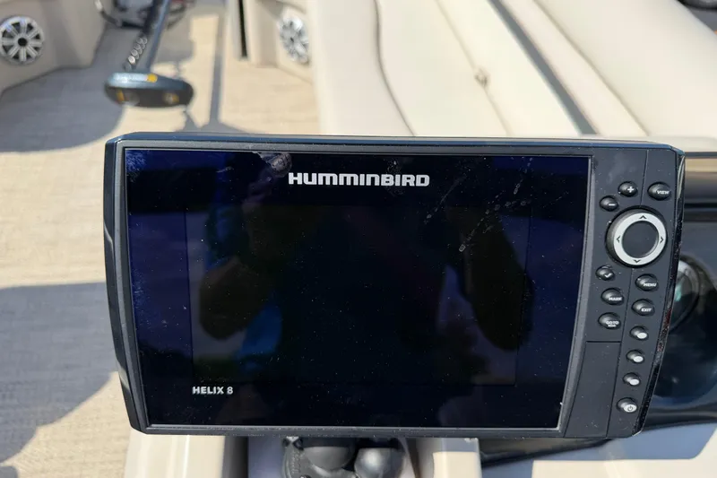 Slide: The Image of Humminbird Helix 8 fish finder on 2018 Bennington 21 SF boat dashboard. - 7