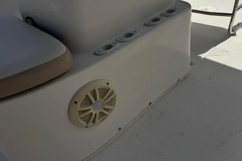 Slide: The Image of 2013 Carolina Skiff Sea Chaser 1950 RG boat interior with speaker and rod holders. - 15