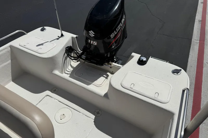 Slide: The Image of 2013 Carolina Skiff Sea Chaser 1950 RG with Suzuki 115 outboard motor. - 16