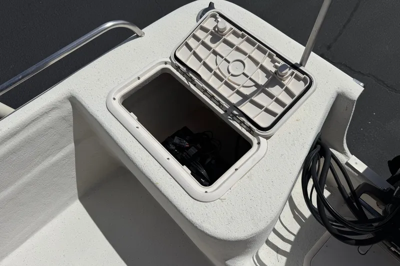 Slide: The Image of Open storage compartment on 2013 Carolina Skiff Sea Chaser 1950 RG boat. - 18