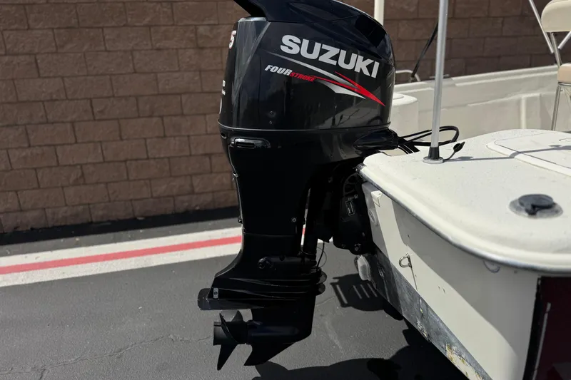 Slide: The Image of 2013 Carolina Skiff Sea Chaser 1950 RG with Suzuki outboard motor. - 6
