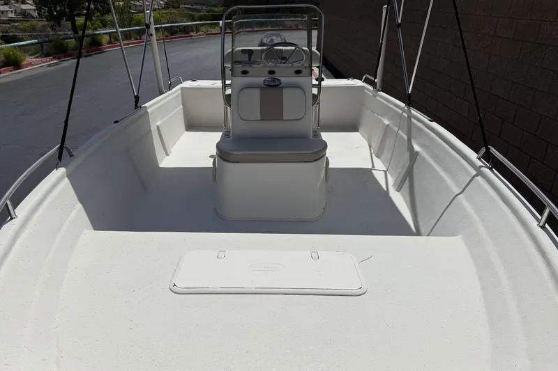 Slide: The Image of 2013 Carolina Skiff Sea Chaser 1950 RG boat interior with console and seating. - 8