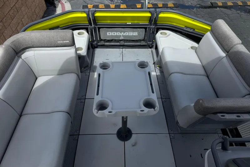 Slide: The Image of 2023 Sea-Doo Switch Cruise 18 interior with seating and table, featuring modern design. - 12