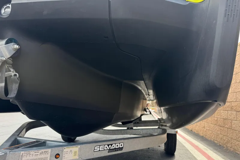 Slide: The Image of 2023 Sea-Doo Switch Cruise 18 hull on trailer, close-up view. - 4