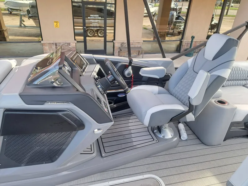 Slide: The Image of Interior of 2025 Avalon Catalina Quad Lounge Shift with modern helm station. - 16
