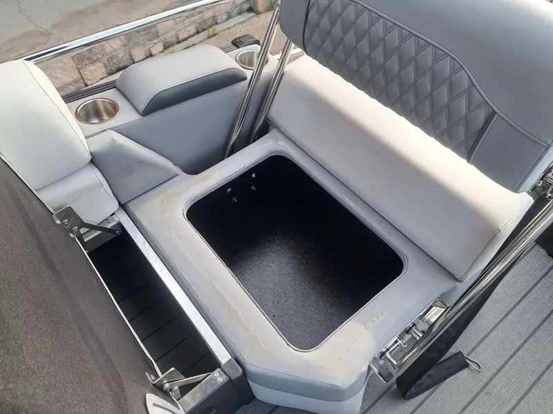 Slide: The Image of Interior of 2025 Avalon Catalina Quad Lounge Shift with storage compartment. - 26