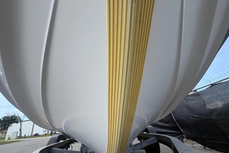 Slide: The Image of 2018 Yamaha Boats 190 FSH hull on trailer, showcasing keel design. - 10