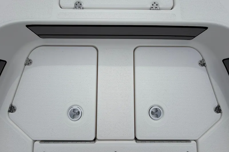 Slide: The Image of 2018 Yamaha Boats 190 FSH deck storage compartments, featuring secure latches and durable design. - 36