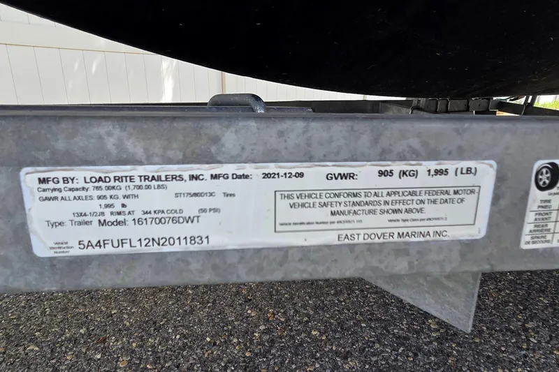 Slide: The Image of Trailer label for Load Rite Trailers, 2021, showing specifications and compliance details. - 10