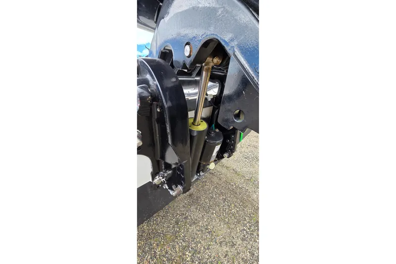 Slide: The Image of Close-up of 2004 Boston Whaler 150 Sport boat engine components. - 11