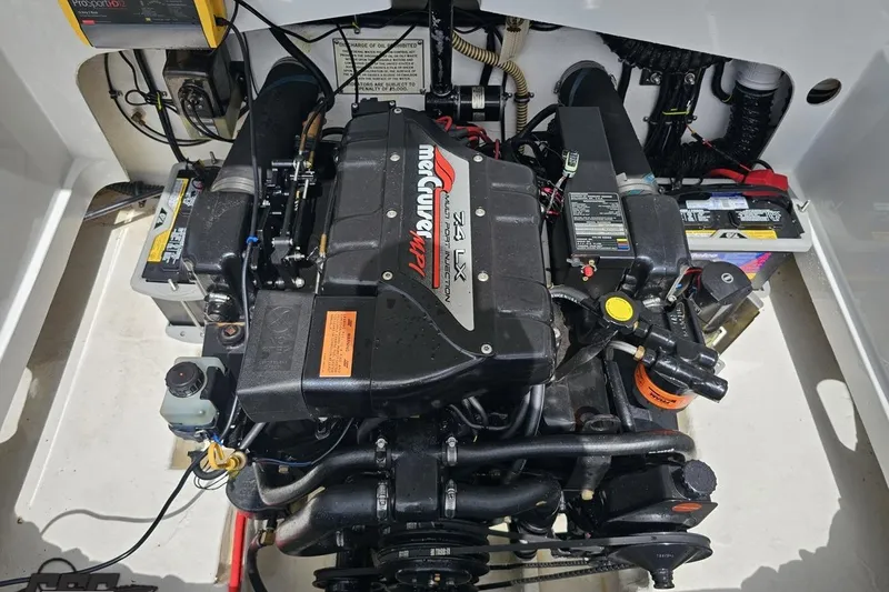 Slide: The Image of Engine compartment of a 1997 Formula 252 SS boat featuring a MerCruiser 7.4L MPI engine. - 100