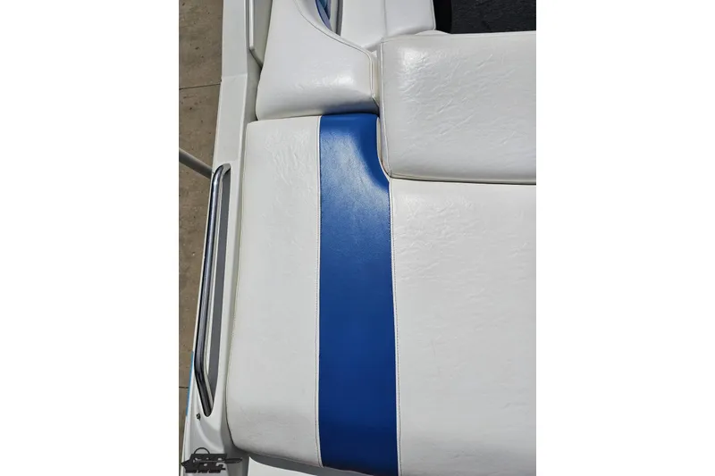 Slide: The Image of White and blue seat upholstery of a 1997 Formula 252 SS boat. - 40