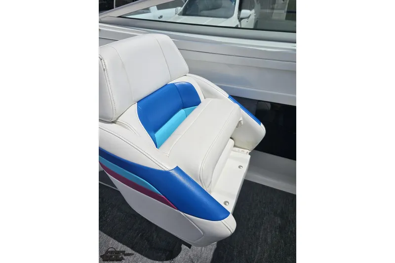 Slide: The Image of White and blue seat on a 1997 Formula 252 SS boat. - 54
