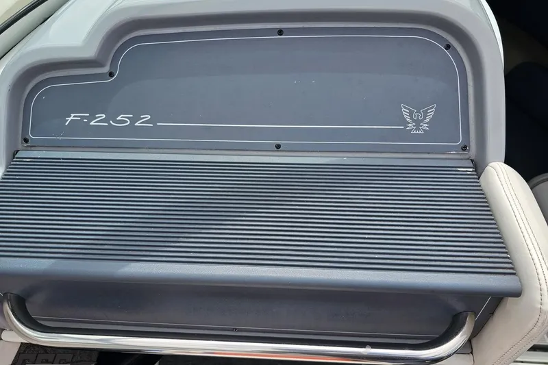 Slide: The Image of 1997 Formula 252 SS dashboard with F-252 emblem and eagle logo. - 55