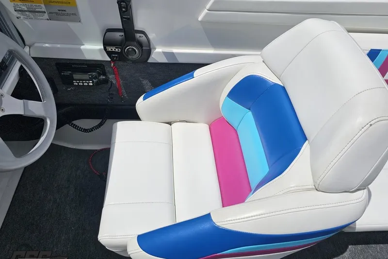 Slide: The Image of Captain's seat of 1997 Formula 252 SS boat with colorful upholstery. - 61