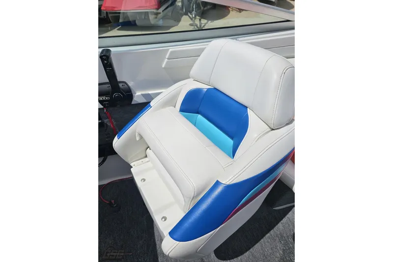 Slide: The Image of White and blue seat in a 1997 Formula 252 SS boat interior. - 62